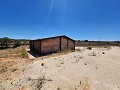 27,000m2 of land with wooden cabin in Alicante Dream Homes API 1122