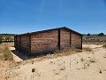 27,000m2 of land with wooden cabin in Alicante Dream Homes API 1122